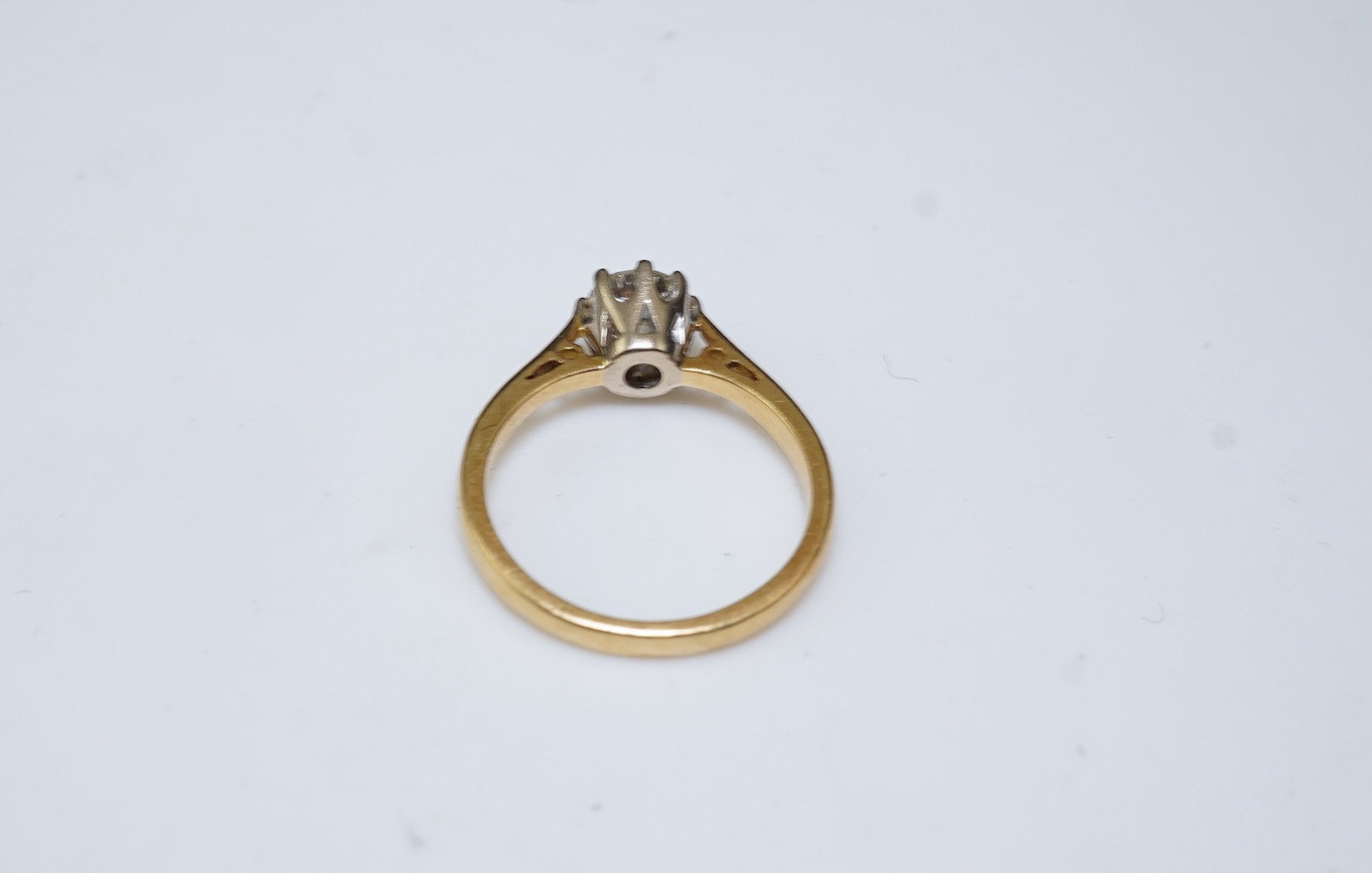 A diamond solitaire ring